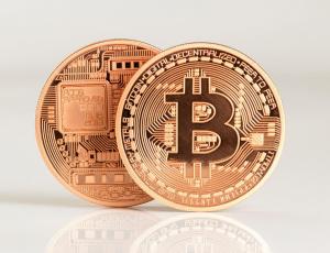 Биткоин приблизился к историческому максимуму, но не удержал позиции